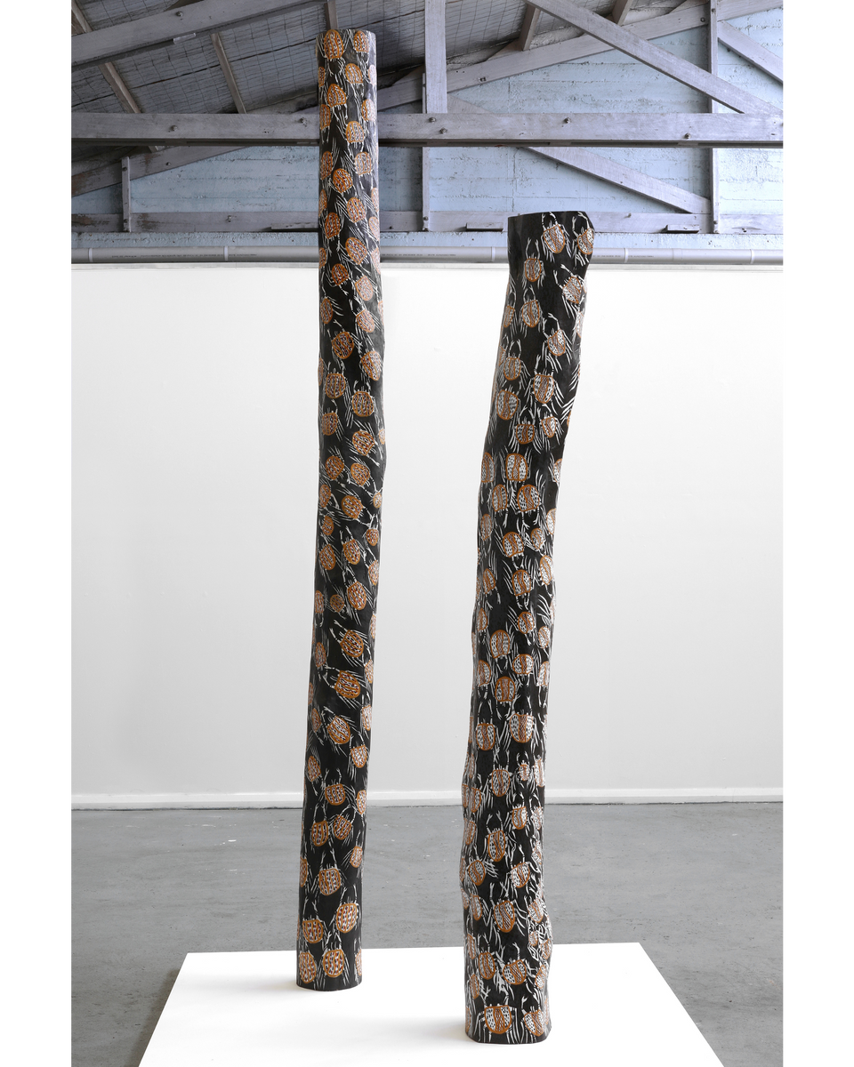 Aboriginal Artwork by Datjuluma Guyula Caroline, Gunyan, Pair of Larrakitj 268cm