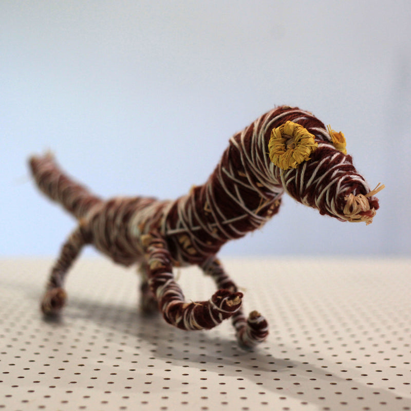 Aboriginal Artwork by Yuminia Kenta, Pukatja - Tjanpi Papa (dog) Sculpture